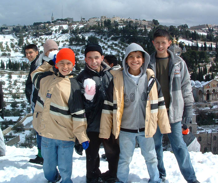 Arab kids playing in the snow in Jerusalem