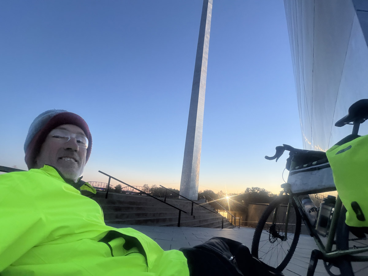 Mark Haughwout and his bicycle at the St. Louis arch